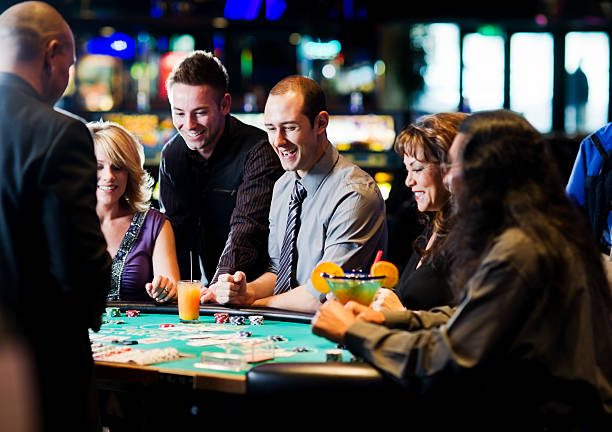 Dream Gaming live baccarat table on mutubet mobile interface showing dealer and real-time play